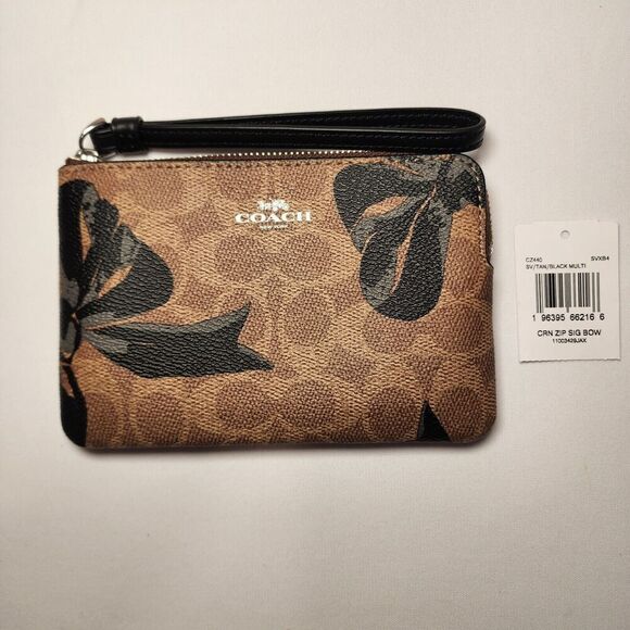 NWT Coach CZ440 Corner Zip Wristlet Tan Signature Black Bows V2 - Picture 1 of 3